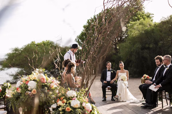 Wedding couple during their outdoor ceremony